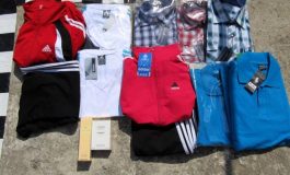Polițiștii i-au întocmit dosar penal unui fălticenean care vindea haine contrafăcute într-un centru comercial